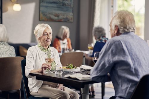 a group of people sitting at a table