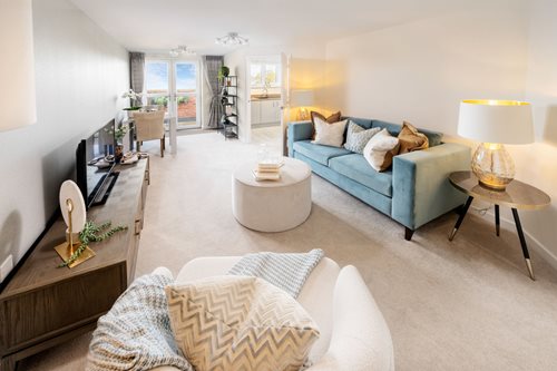 a living room with a couch and a coffee table