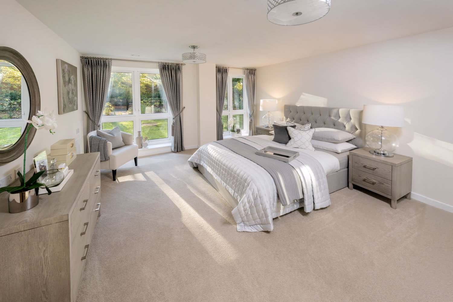 a bedroom with a bed and a chair