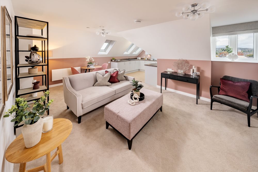 a living room with a white couch and a coffee table