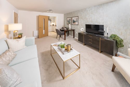 a living room with a tv and couches