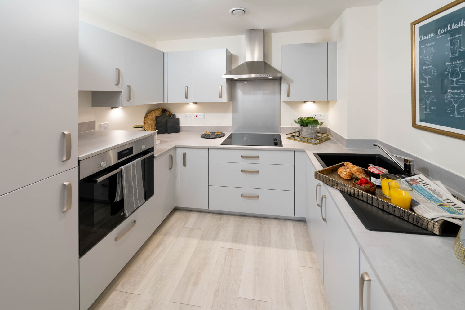 a kitchen with white cabinets