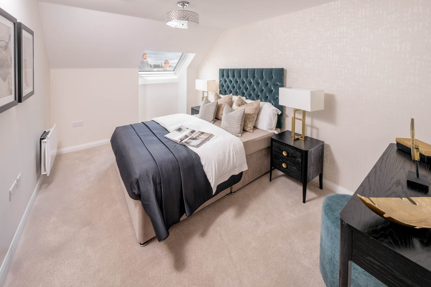 a bedroom with a bed and a desk