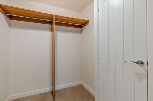 a wooden shelf in a room
