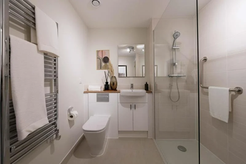 a bathroom with a standup shower