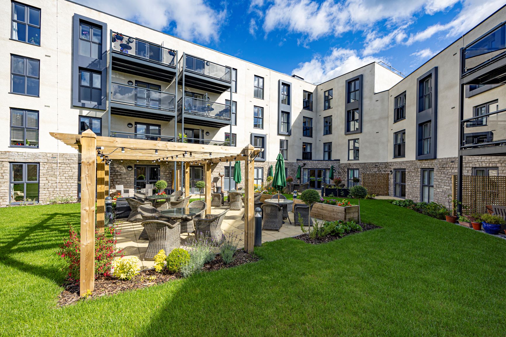 a building with a play structure in the front
