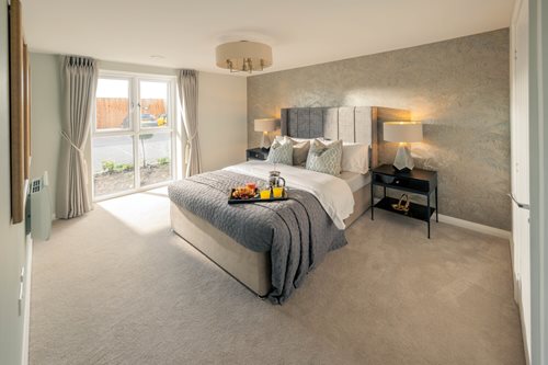 a bedroom with a large bed