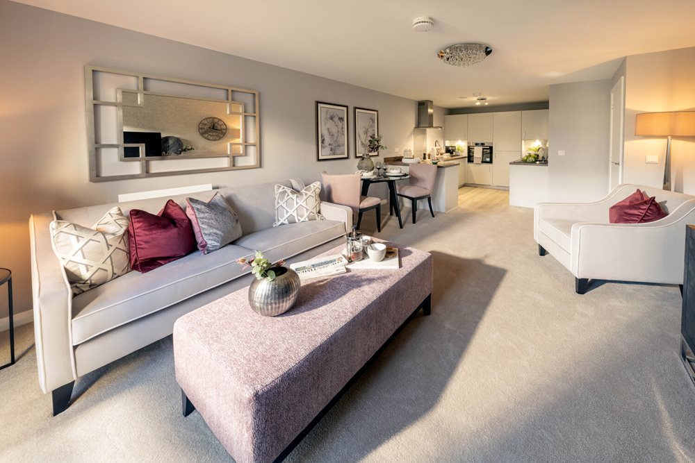 a living room with a couch and a table