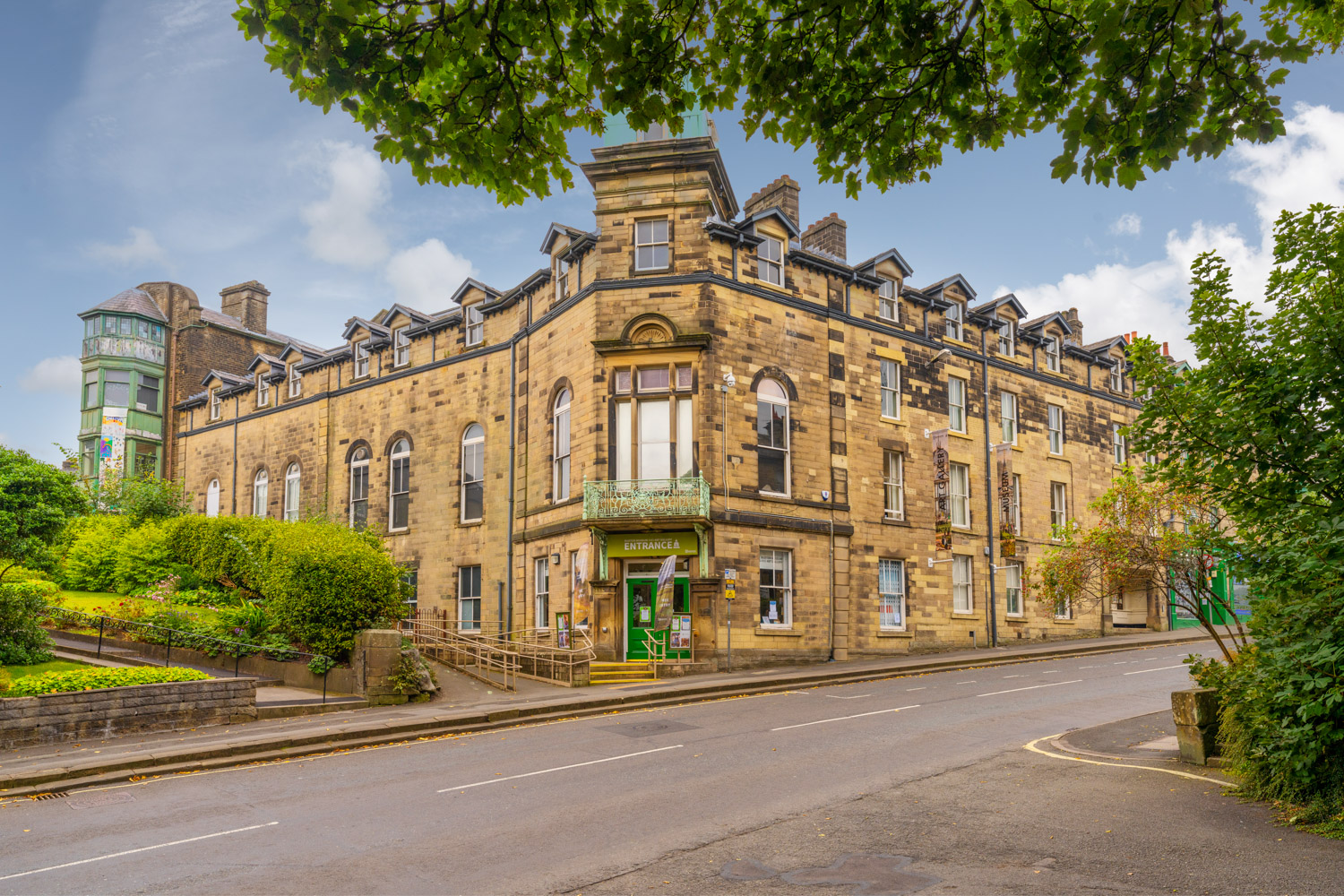 a large building with a street in front of it