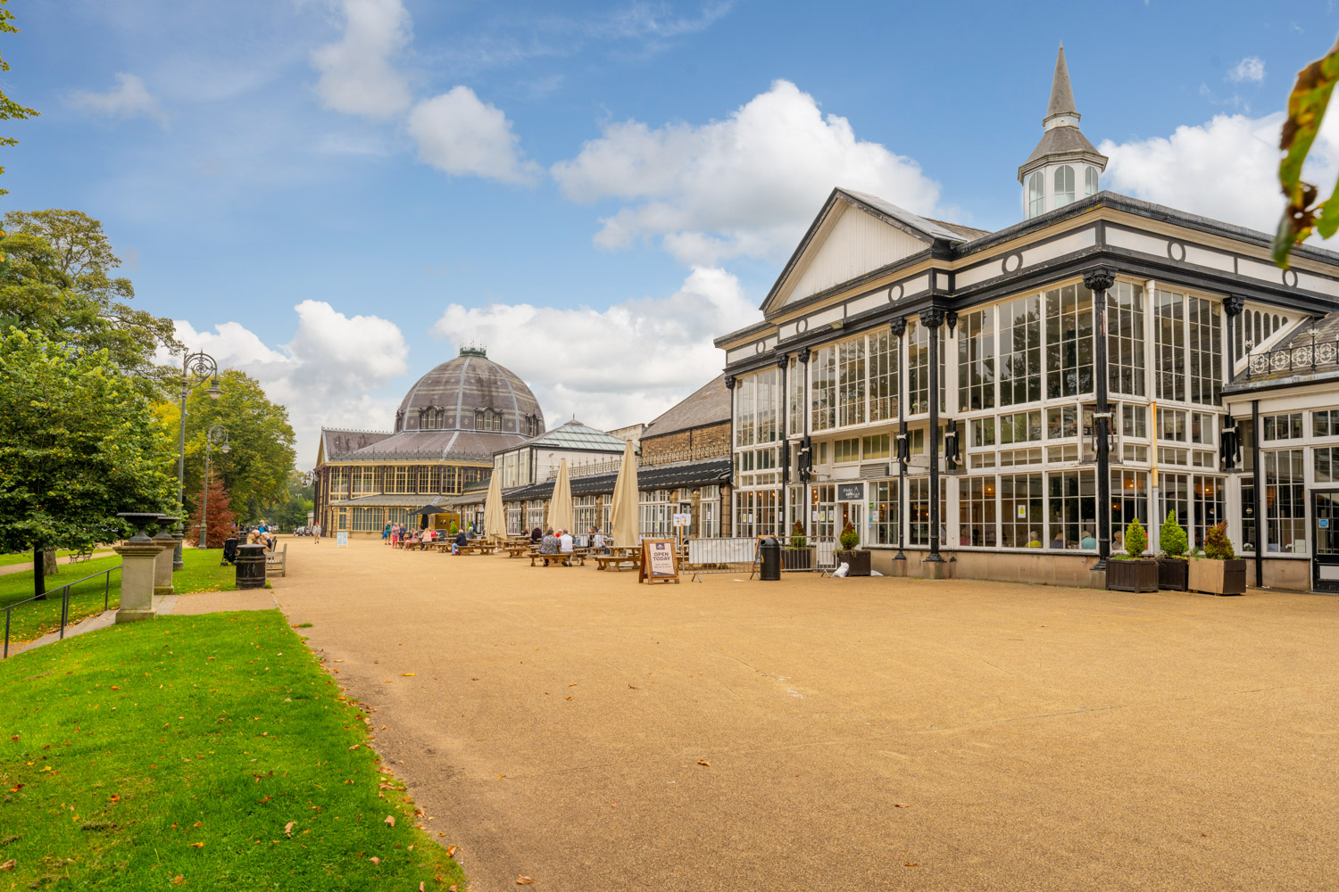 a courtyard with buildings and trees