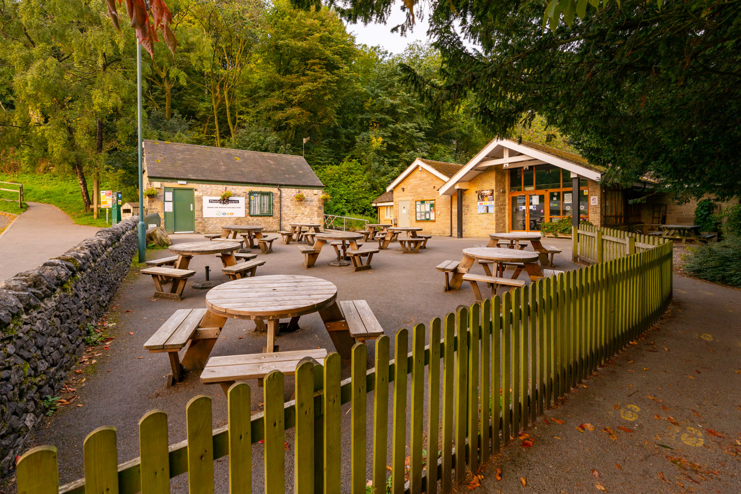 a group of tables and chairs outside