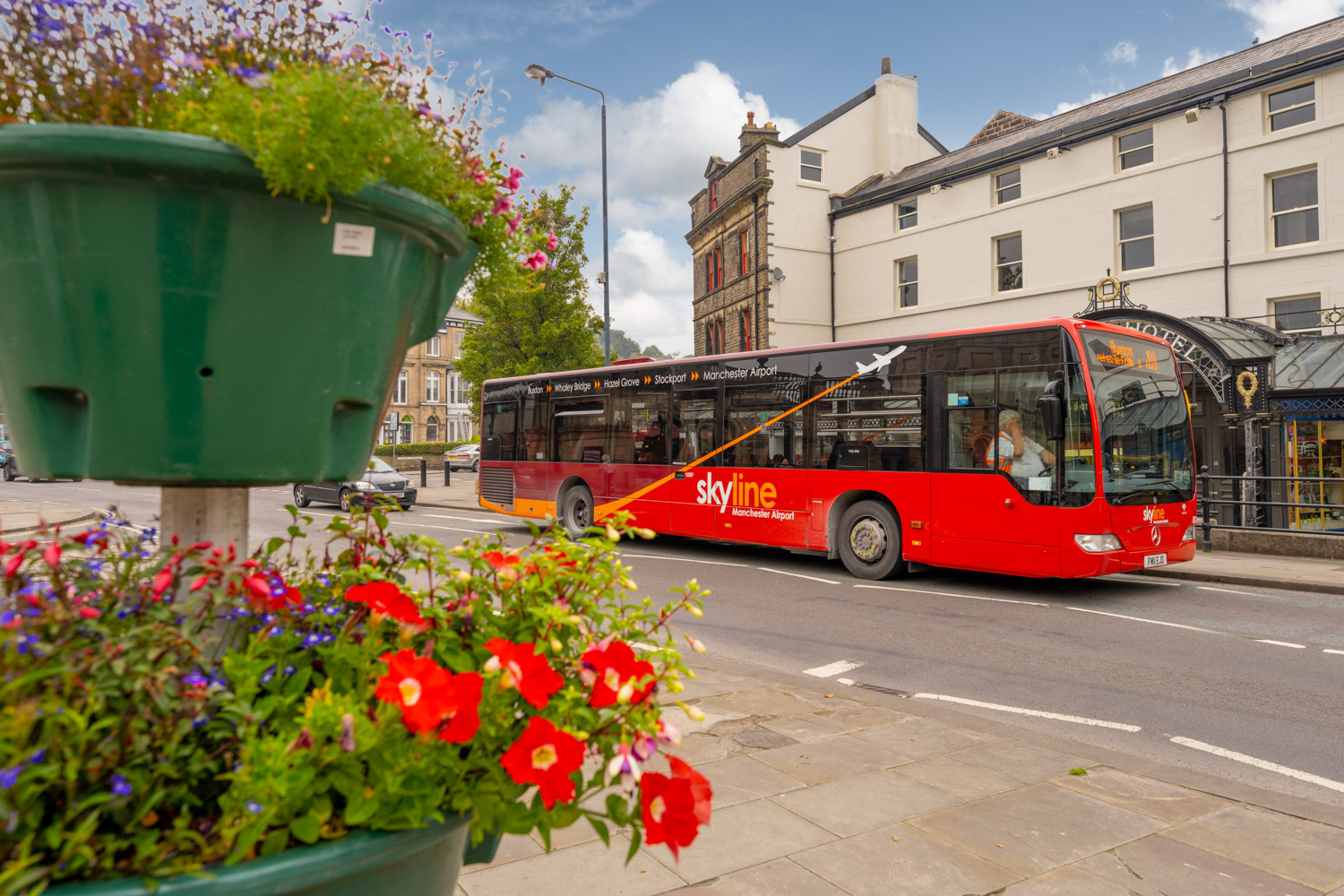 a bus travels down the street