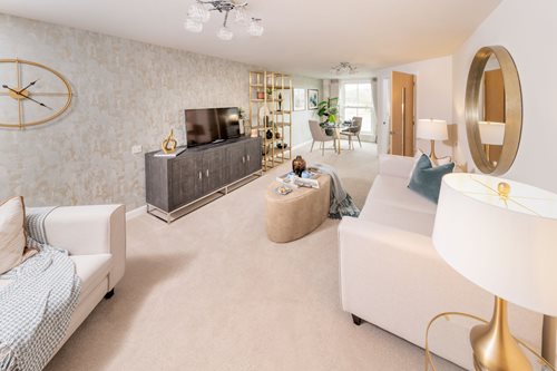 a living room with white couches