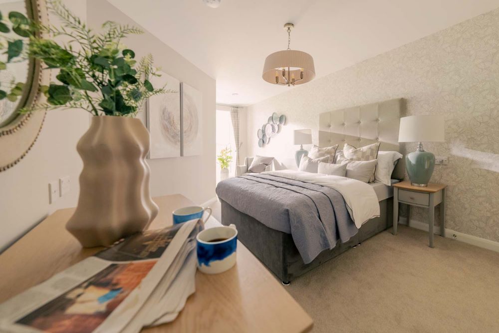 a bedroom with a large vase