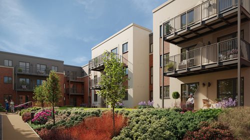 a building with a garden in front