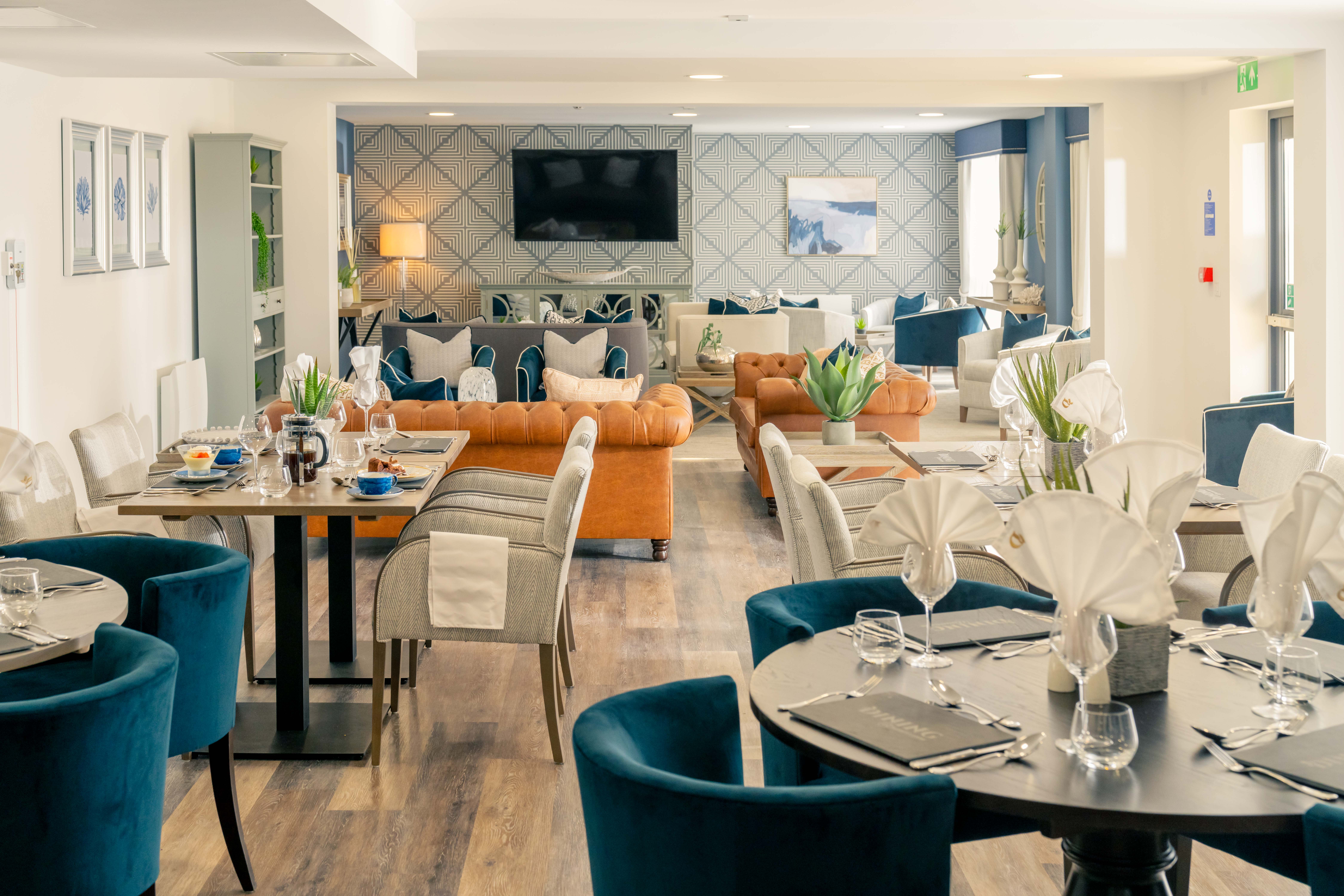 a room with tables and chairs