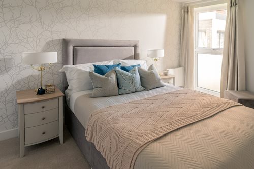 a bed with white pillows