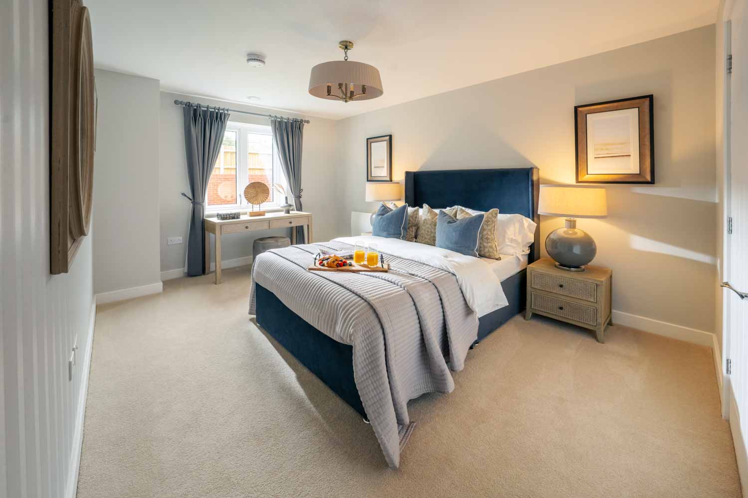 a bedroom with a bed and a table
