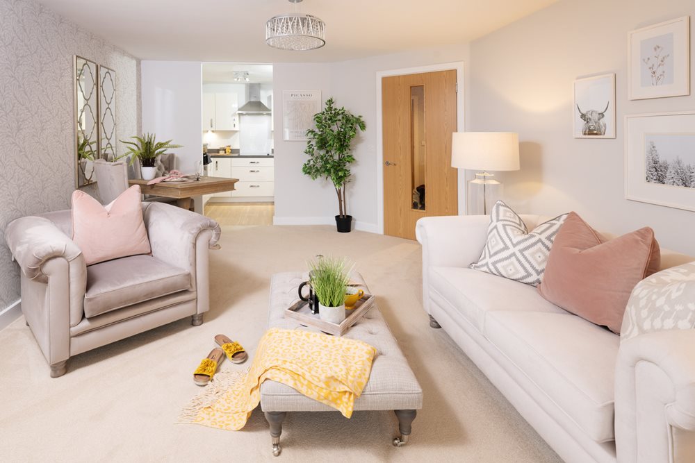 a living room with a couch and a table