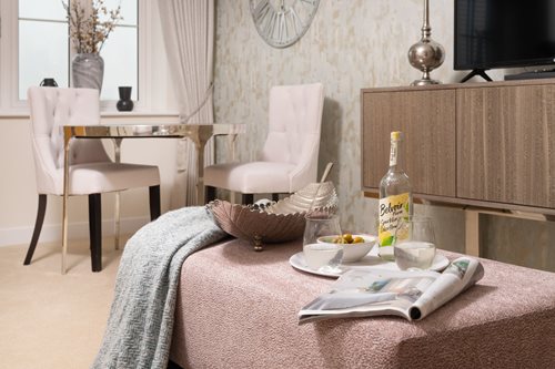 a table with a basket and chairs