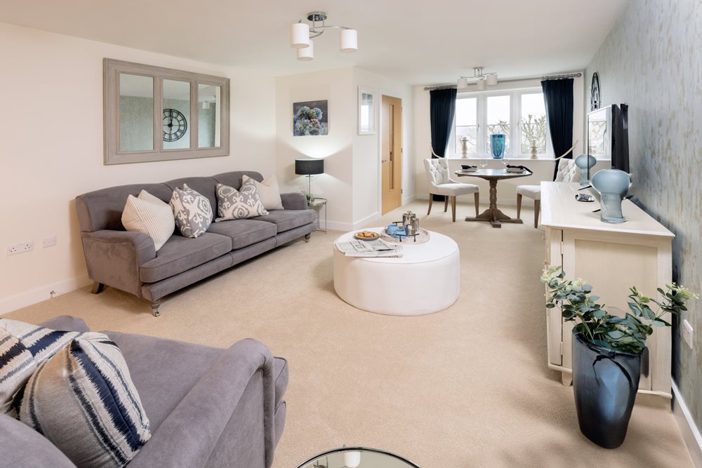 a living room with a couch and a coffee table