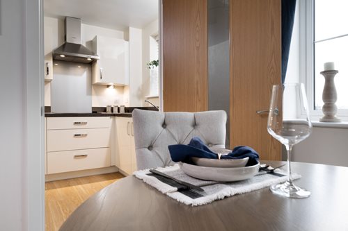 a living room with a couch and a table