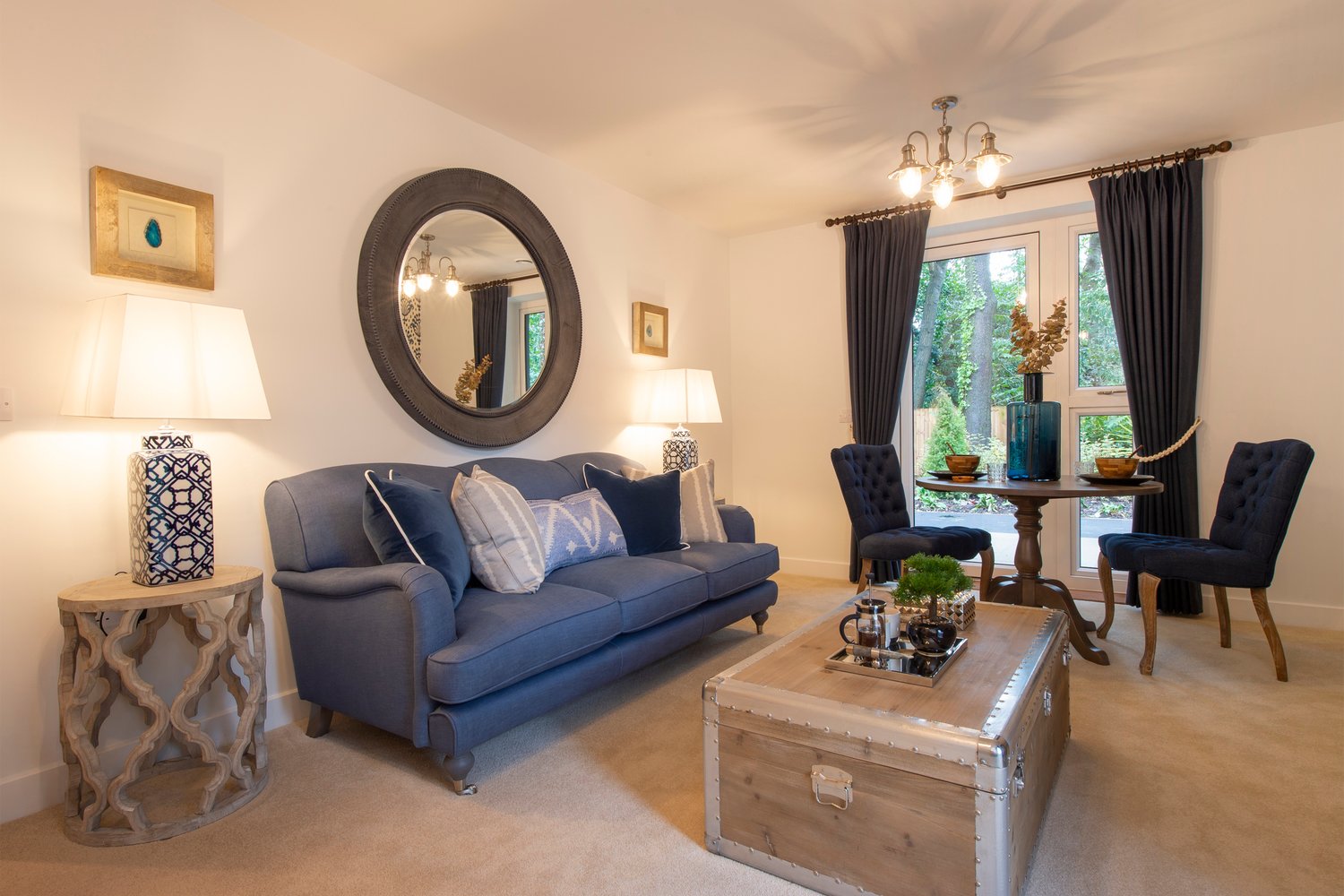 a living room with a blue couch