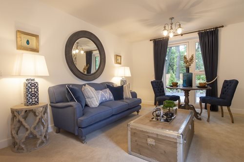 a living room with a blue couch