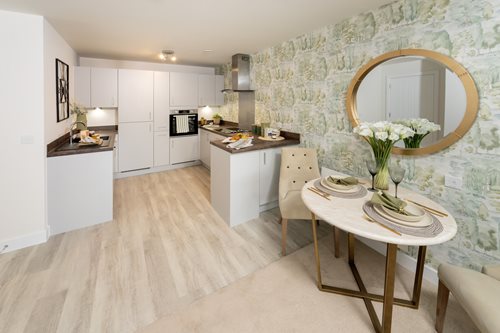 a kitchen with a dining table