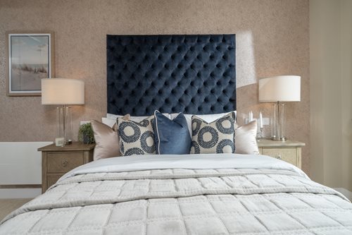 a bed with pillows