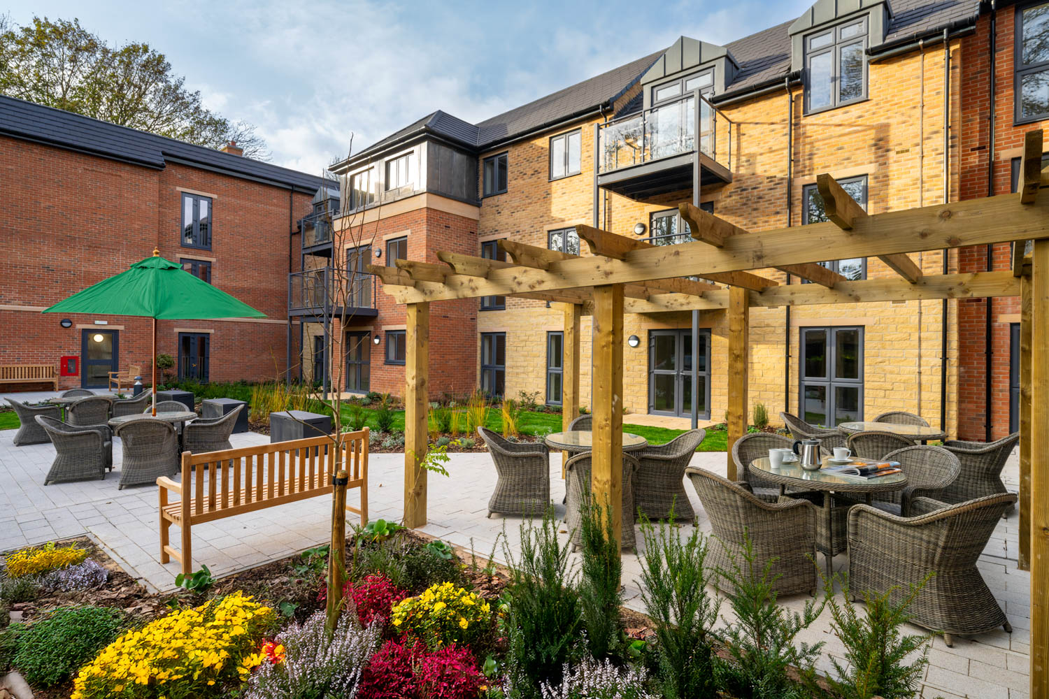 a courtyard with tables and chairs