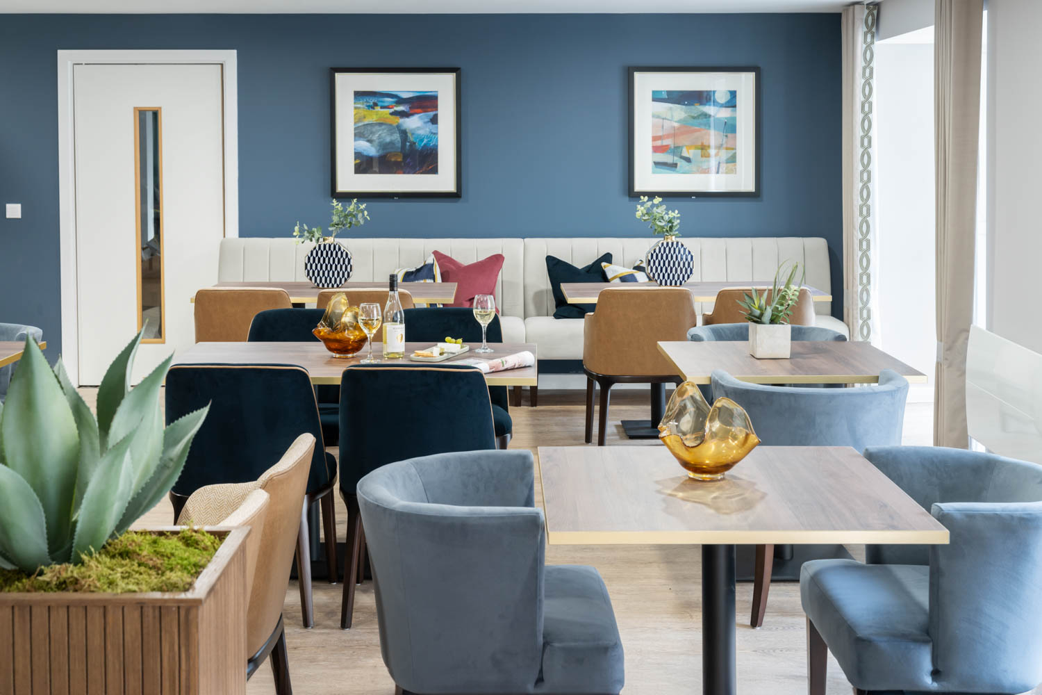 a room with tables and chairs
