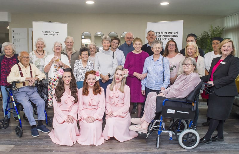 a group of people posing for a photo