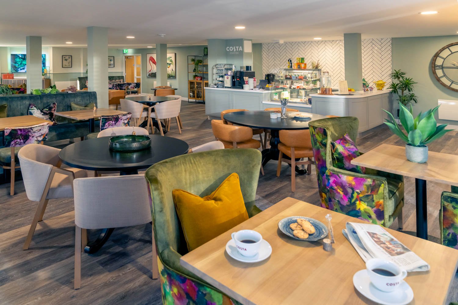 a restaurant with tables and chairs