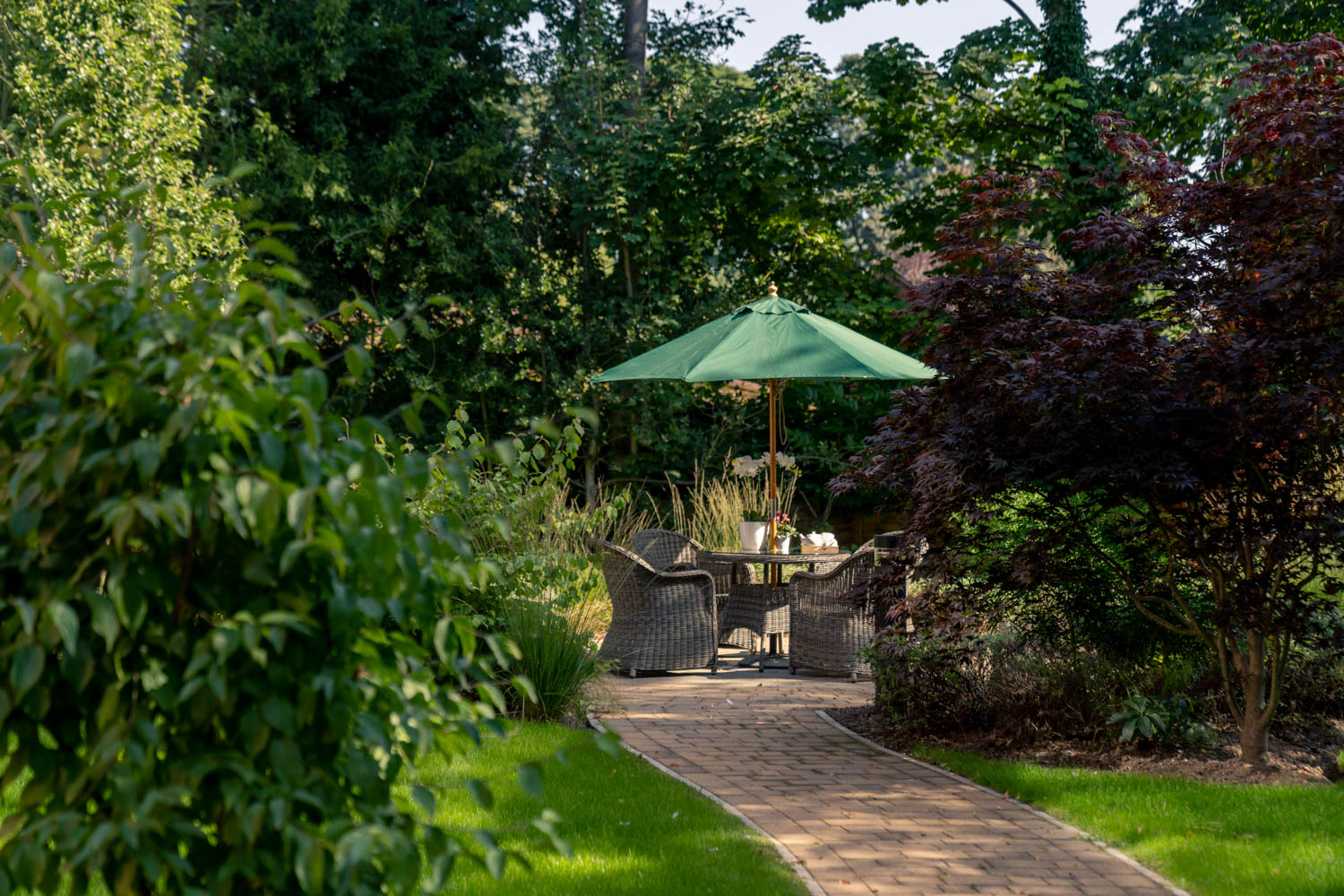 a patio with a table and chairs