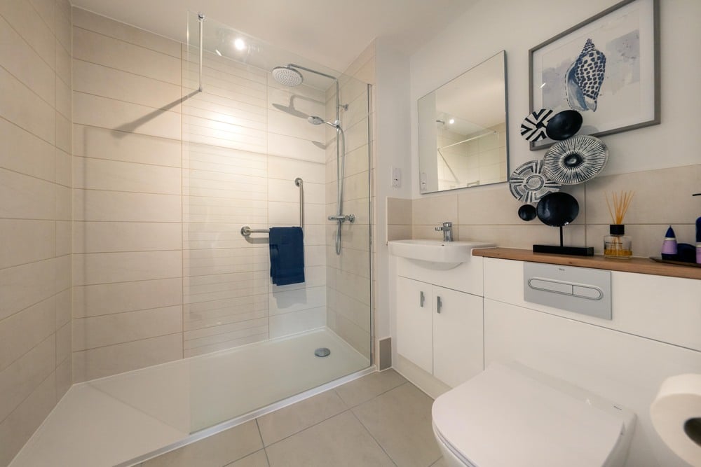 a bathroom with a shower and toilet