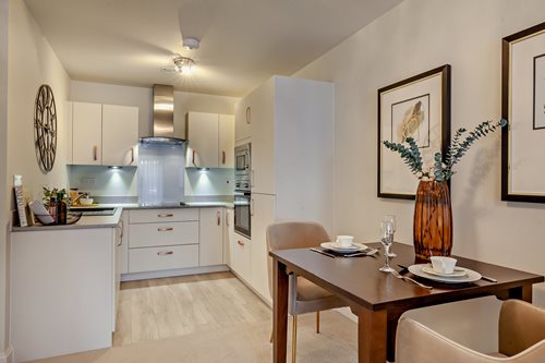 a kitchen with a dining table