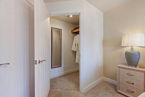 a bathroom with a mirror and a sink