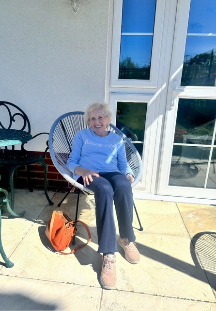 a person sitting in a chair