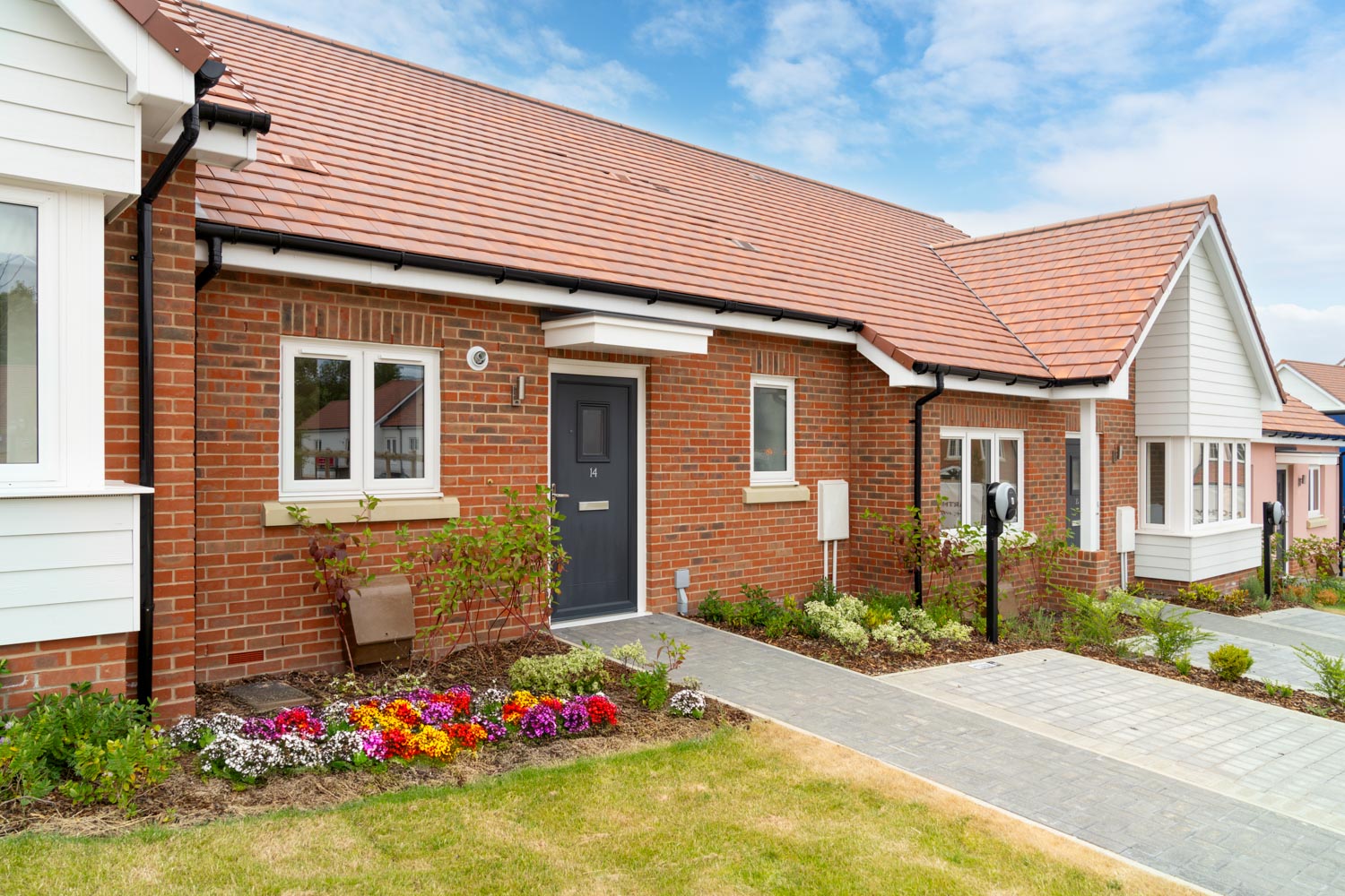 a brick house with a driveway