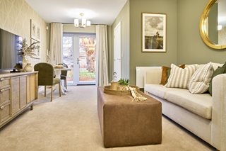 a living room with a couch and a table