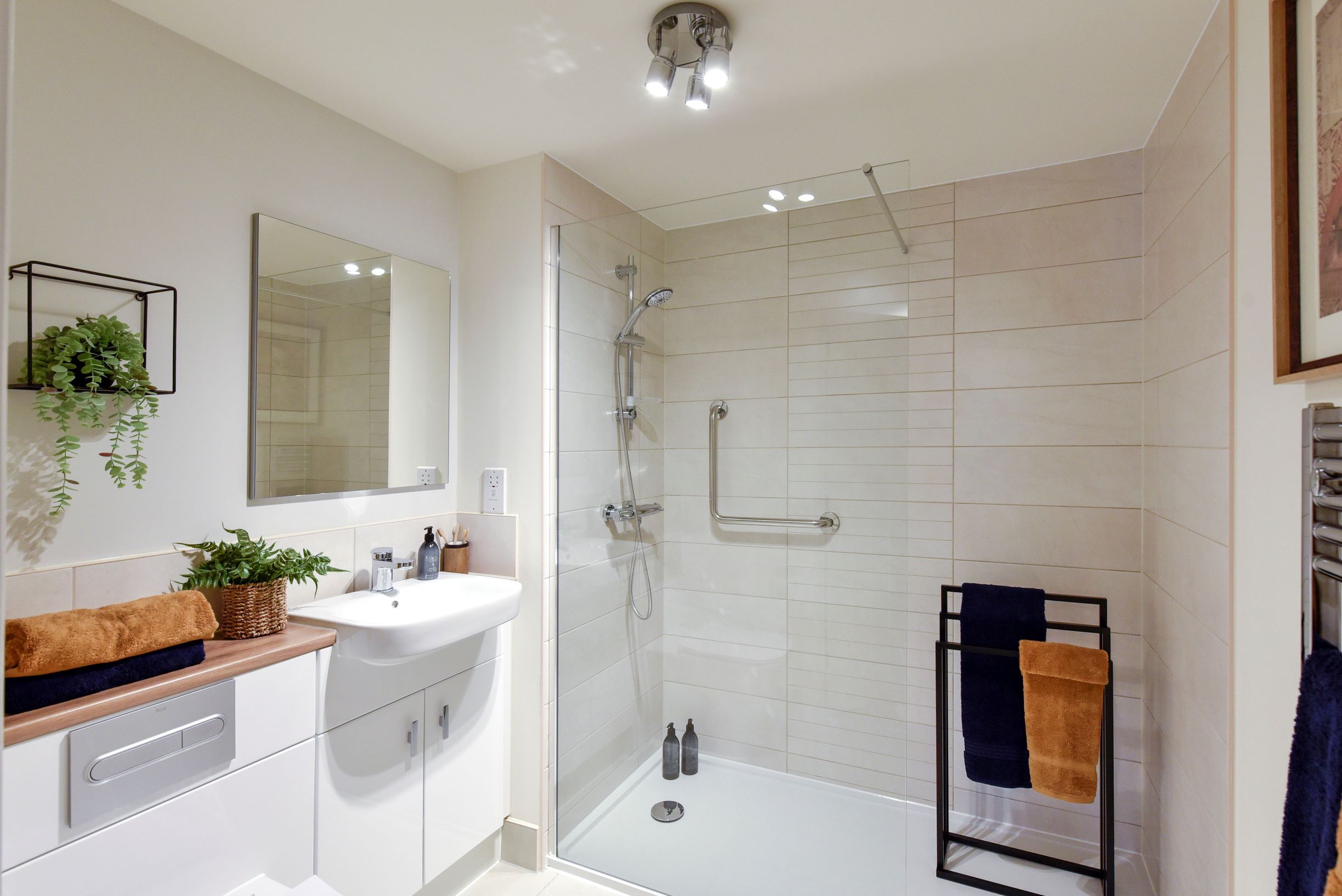 a bathroom with a tub sink and shower