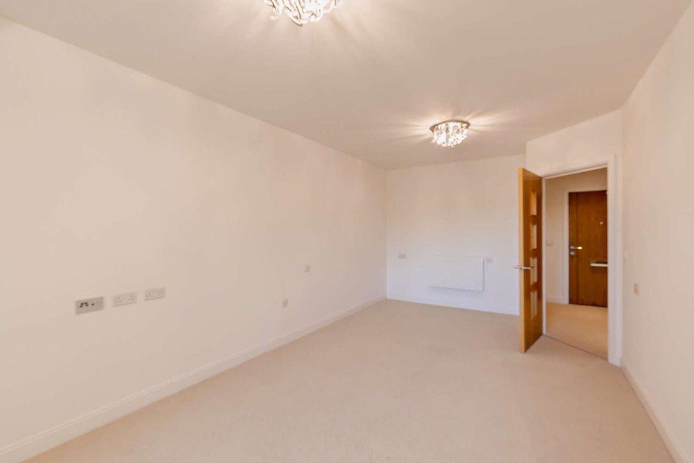 a hallway with a light on the ceiling
