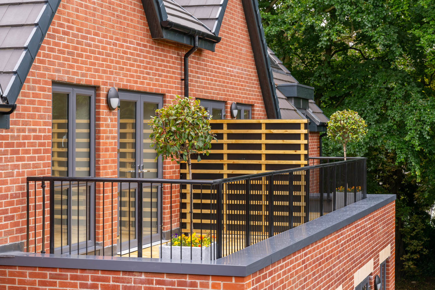 a house with a black railing