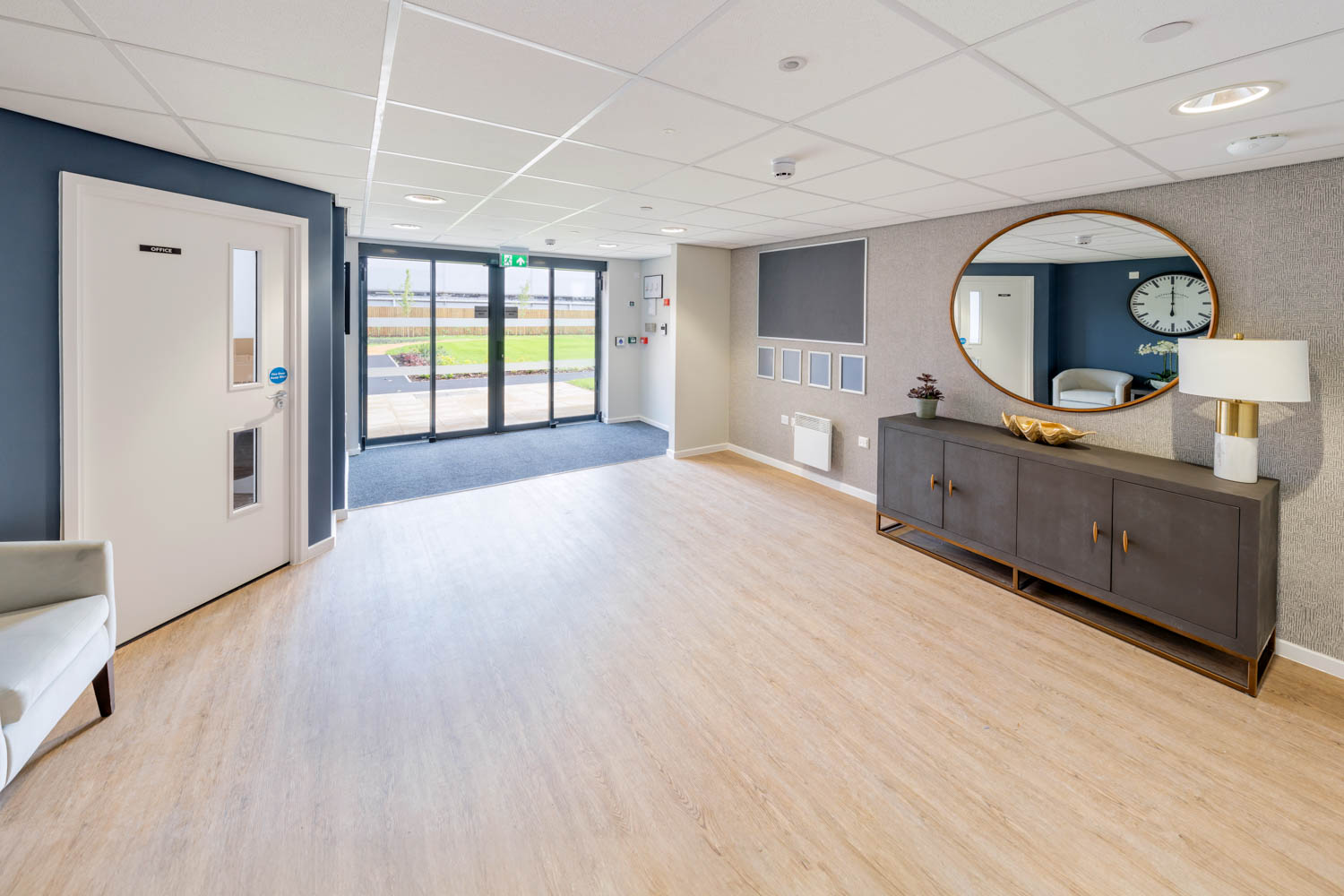a large room with a large mirror