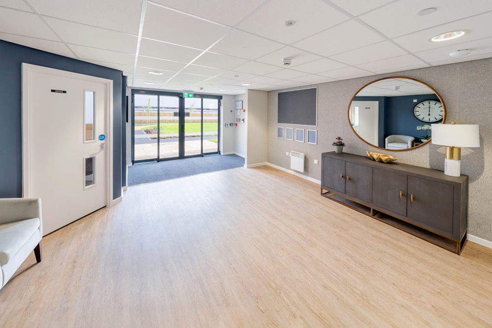 a large room with a large mirror