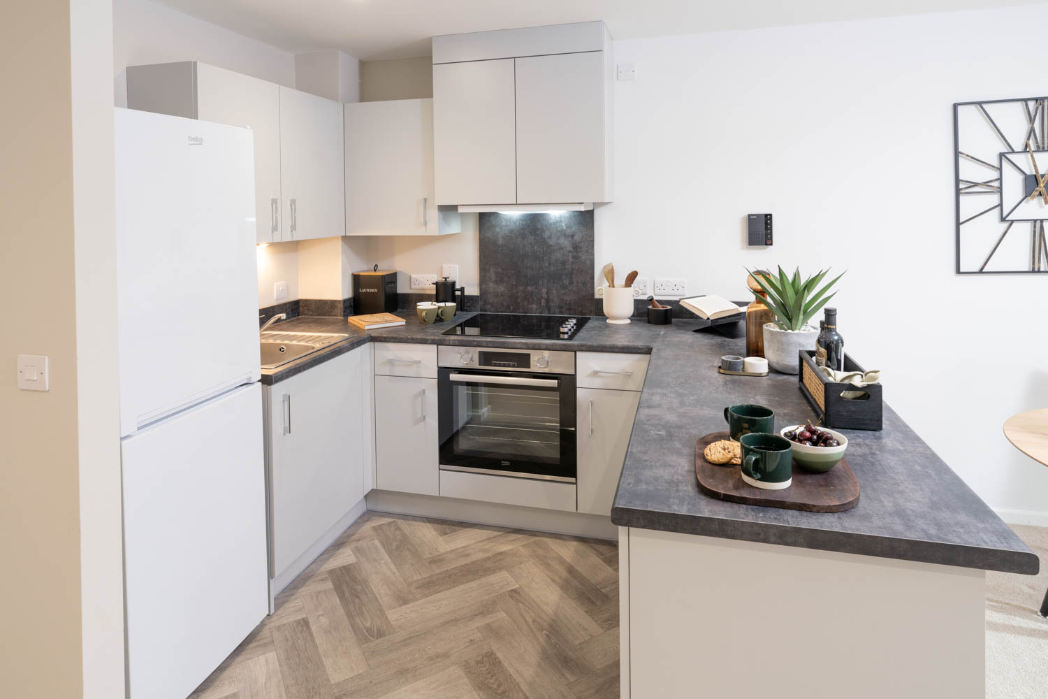 a kitchen with white cabinets