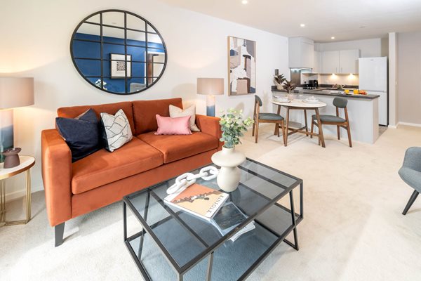 a living room with a couch and a coffee table