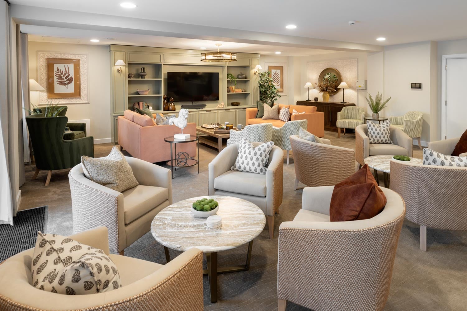 a living room with a large dining room and a large kitchen
