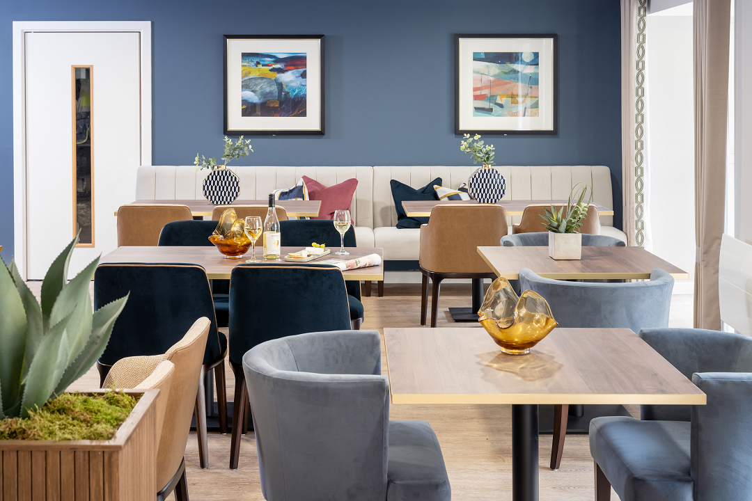 a room with tables and chairs